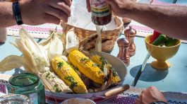Summer Grilling Recipes - Grilled Corn with Chipotle Butter recipe by Pints & Plates featured on frostedevents